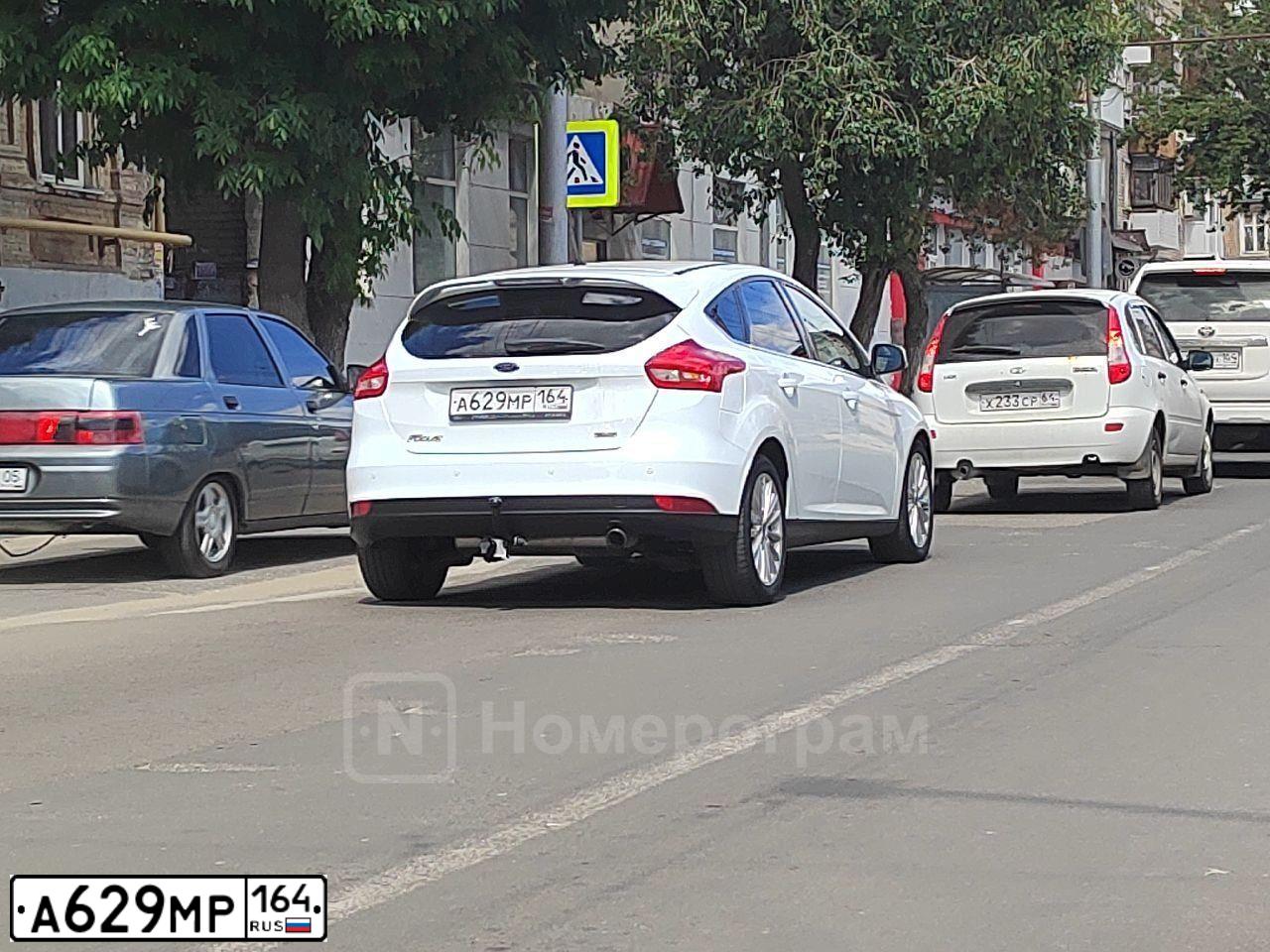 Фото автомобиля FORD FOCUS, 2016 — госномер Т499РУ152. Цвет: Белый