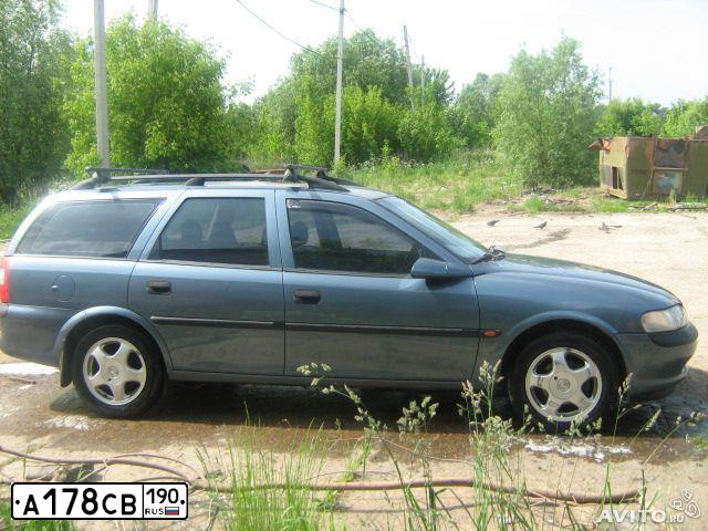 Фото автомобиля OPEL VECTRA, 1998 — госномер В596ЕН797. Цвет: синий