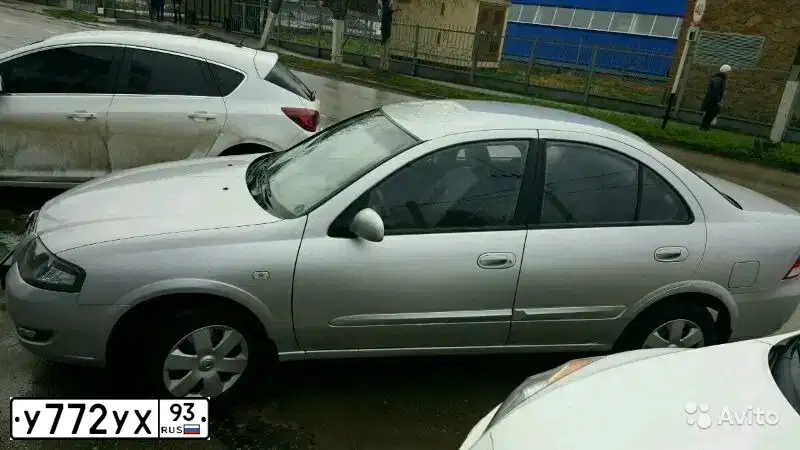 Фото автомобиля NISSAN ALMERA, 2010 — госномер Н238СН123. Цвет: Серебристый