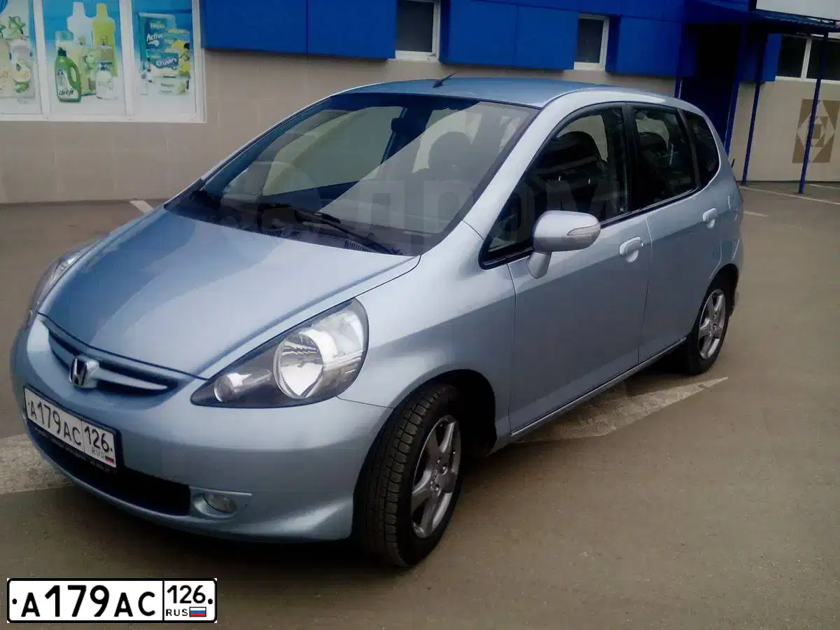 Фото автомобиля HONDA JAZZ, 2008 — госномер А179АС126. Цвет: СЕРО ГОЛУБОЙ