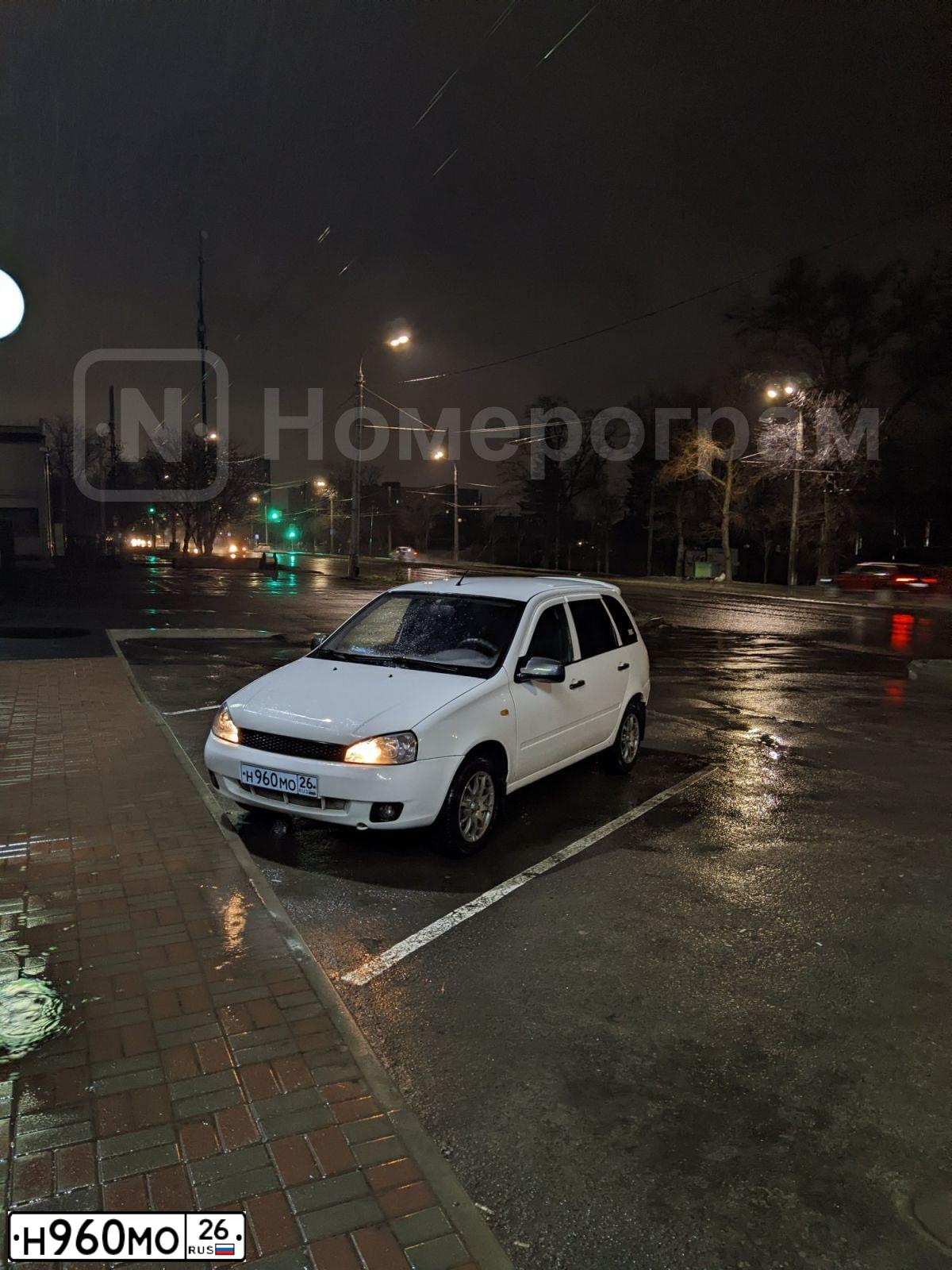 Фото автомобиля LADA 1117 KALINA, 2013 — госномер Н960МО26. Цвет: Белый