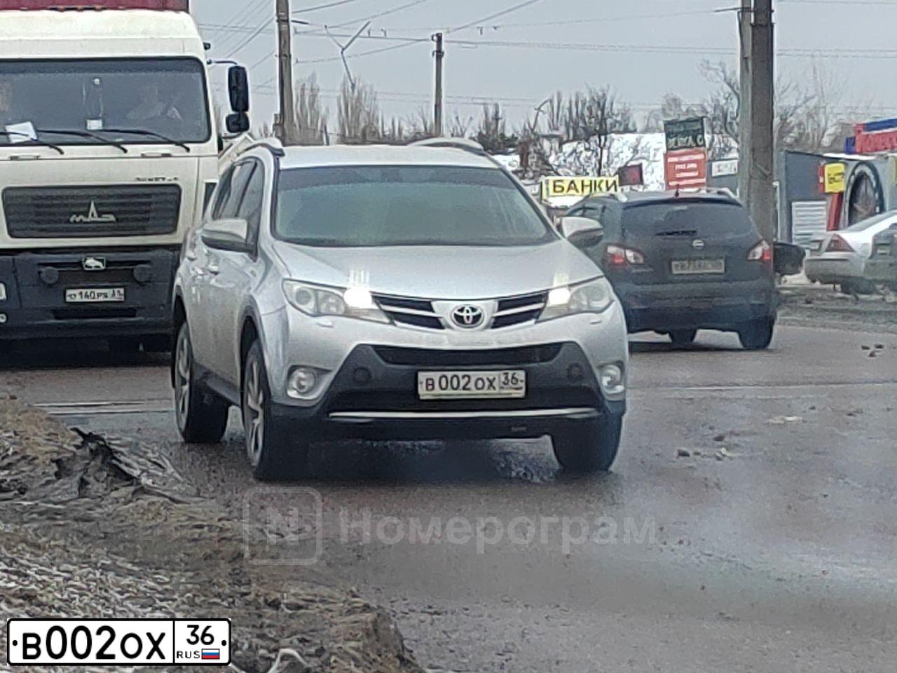 Фото автомобиля NISSAN X-TRAIL, 2008 — госномер В002ОХ36. Цвет: ЧЕРНЫЙ