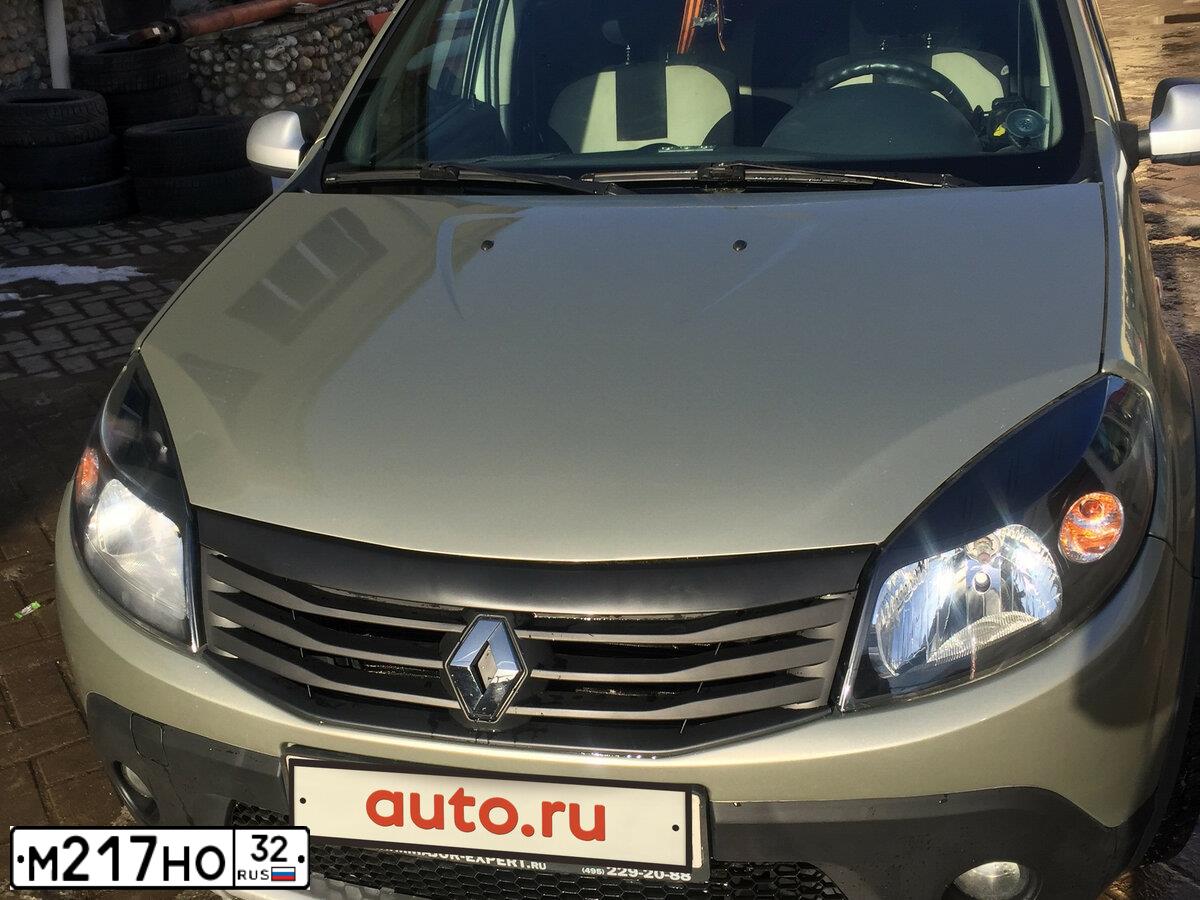 Фото автомобиля RENAULT SANDERO, 2012 — госномер Е075СС69. Цвет: БЕЖЕВЫЙ