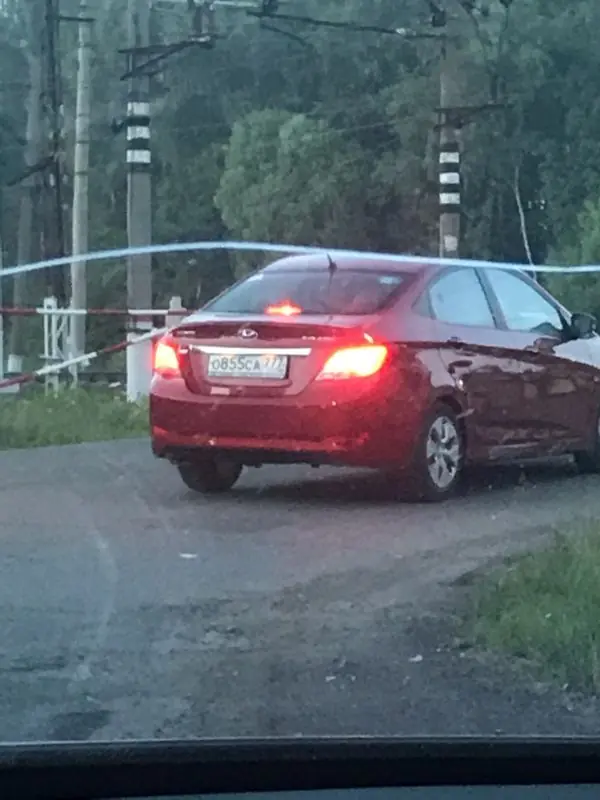 Фото автомобиля HYUNDAI SOLARIS, 2015 — госномер О855СА777. Цвет: КРАСНЫЙ ГРАНАТ