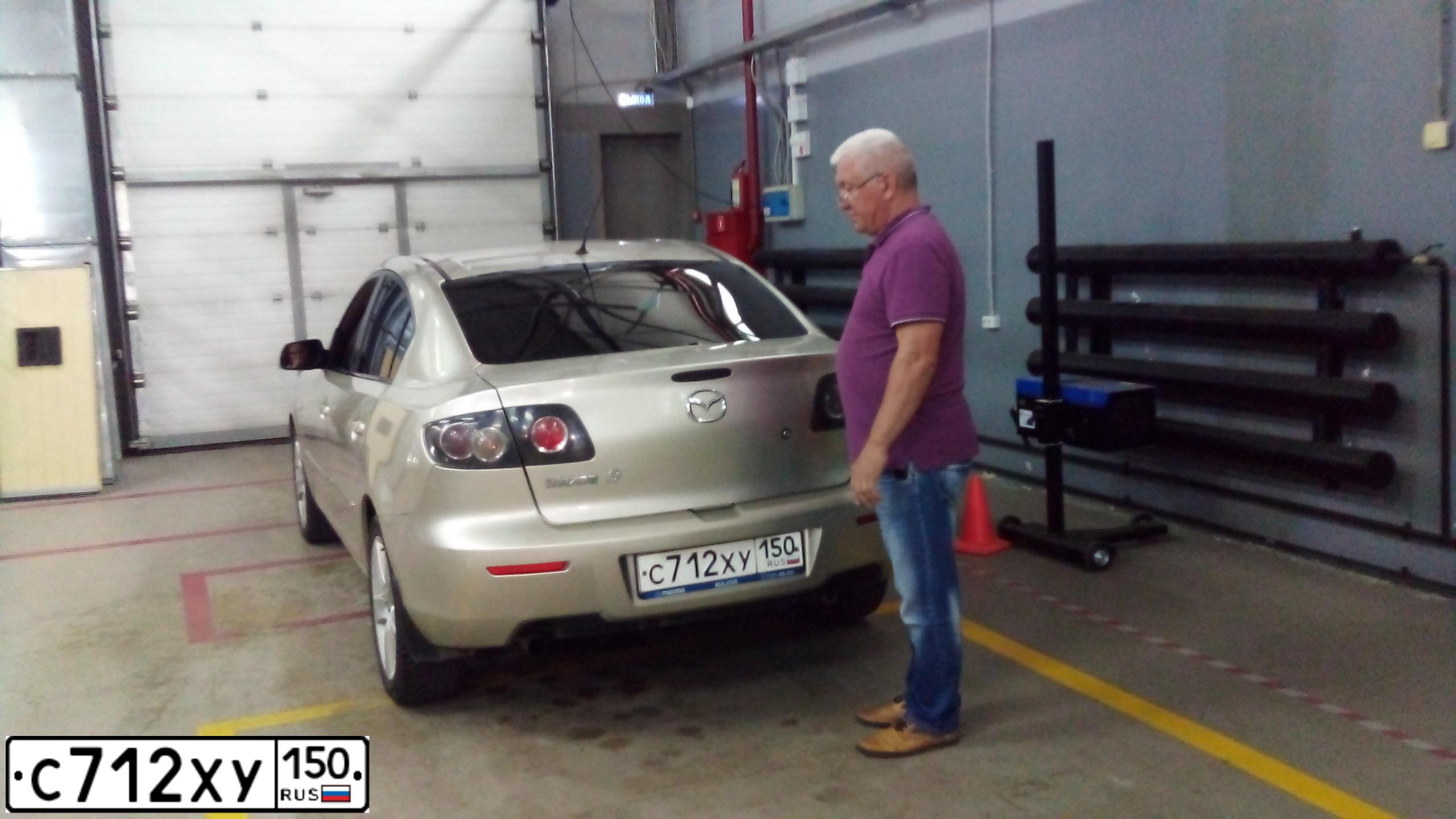Фото автомобиля MAZDA 3, 2006 — госномер С712ХУ150. Цвет: БЕЖЕВЫЙ