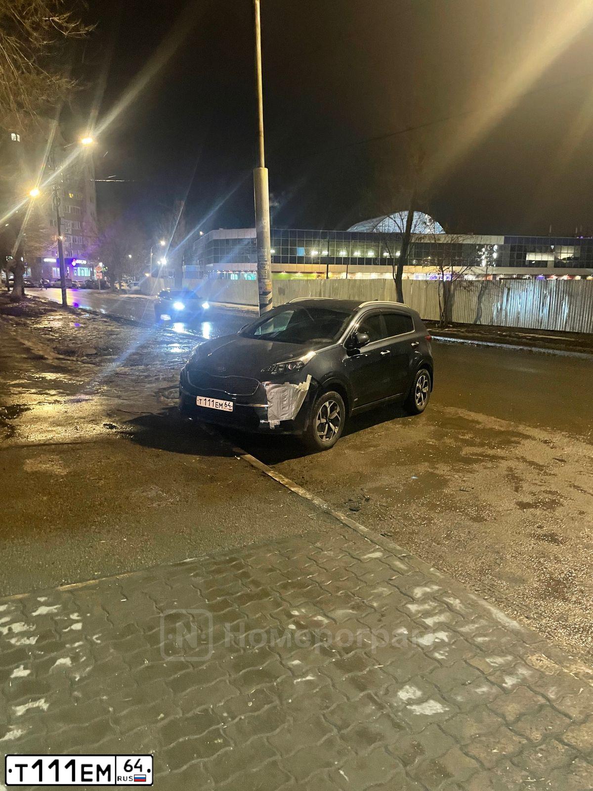 Фото автомобиля KIA SPORTAGE, 2015 — госномер Т111ЕМ64. Цвет: Белый