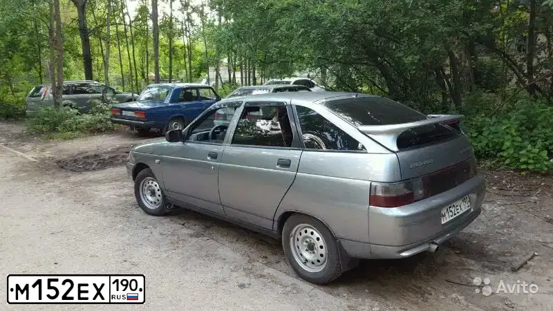 Фото автомобиля LADA 2112, 2006 — госномер М152ЕХ190. Цвет: СРЕДНИЙ СЕРО-ЗЕЛЕНЫЙ МЕТ