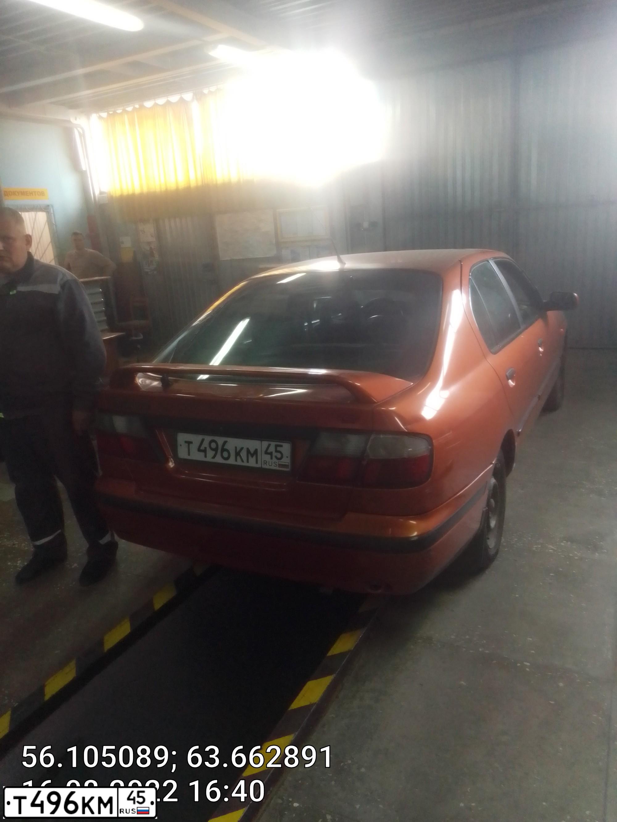 Фото автомобиля NISSAN PRIMERA, 1996 — госномер Х270ОУ72. Цвет: Оранжевый