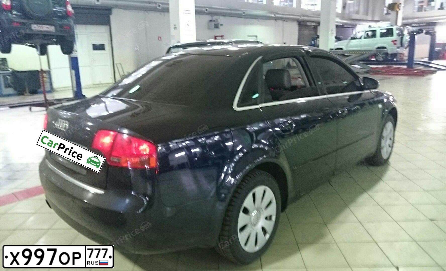 Фото автомобиля GAZ 3110 WOLGA, 1998 — госномер К100ВТ97. Цвет: ЧЕРНЫЙ