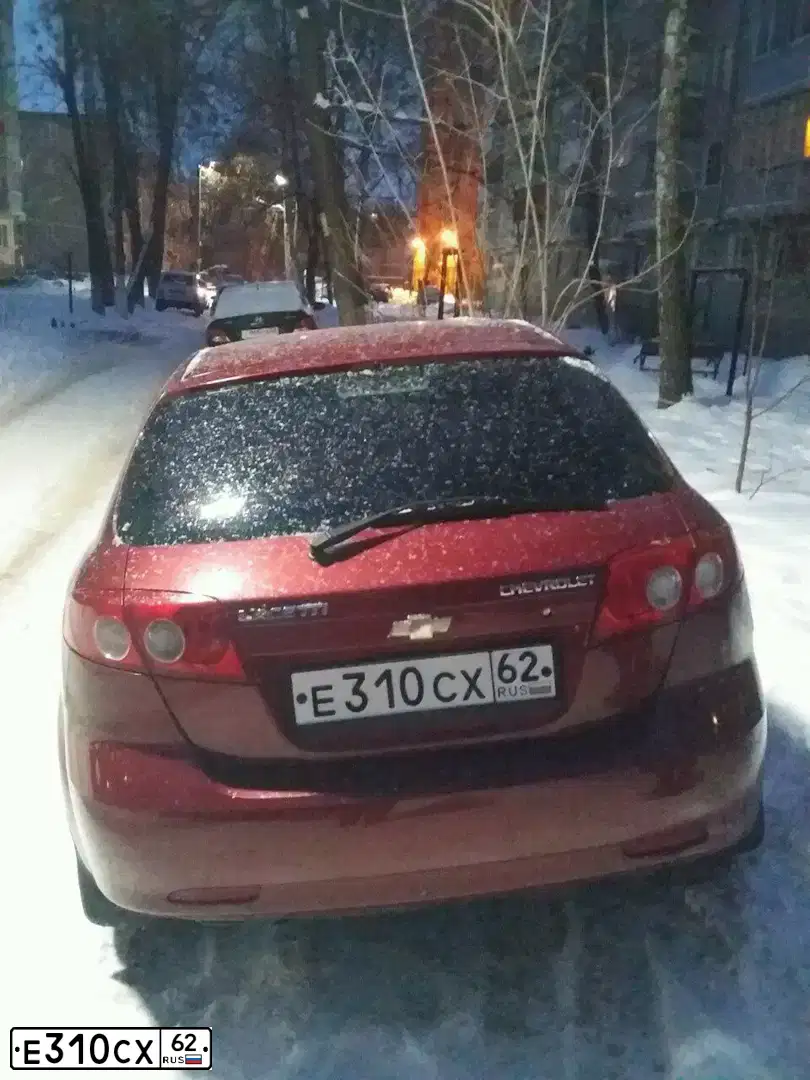 Фото автомобиля CHEVROLET LACETTI, 2007 — госномер К302РТ62. Цвет: Красный