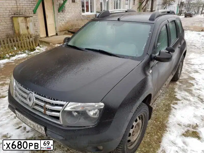 Фото автомобиля RENAULT DUSTER, 2012 — госномер Х680РВ69. Цвет: ЧЕРНЫЙ