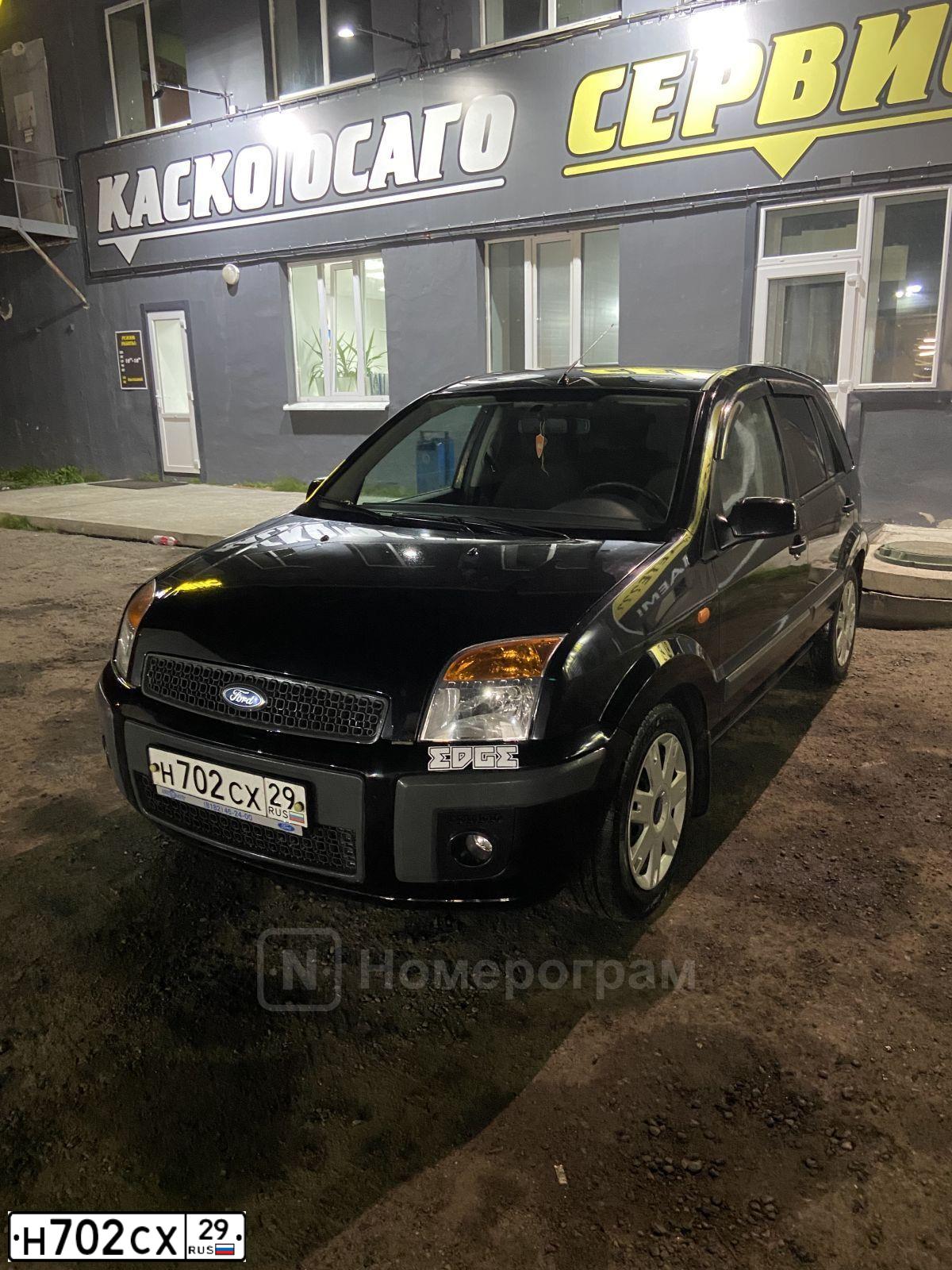Фото автомобиля FORD FUSION, 2008 — госномер Н702СХ29. Цвет: ЧЕРНЫЙ