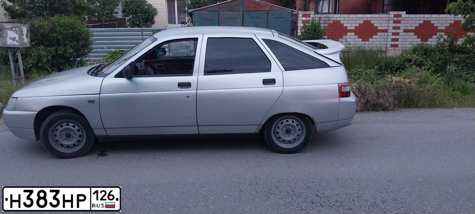 Фото автомобиля LADA 2112 LADA, 2006 — госномер Н383НР126. Цвет: СЕРЫЙ