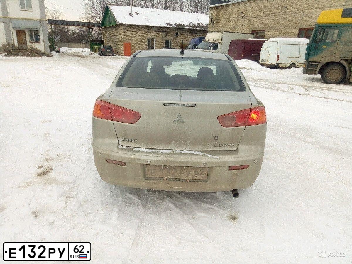 Фото автомобиля MITSUBISHI LANCER, 2007 — госномер Е132РУ62. Цвет: БЕЖЕВЫЙ