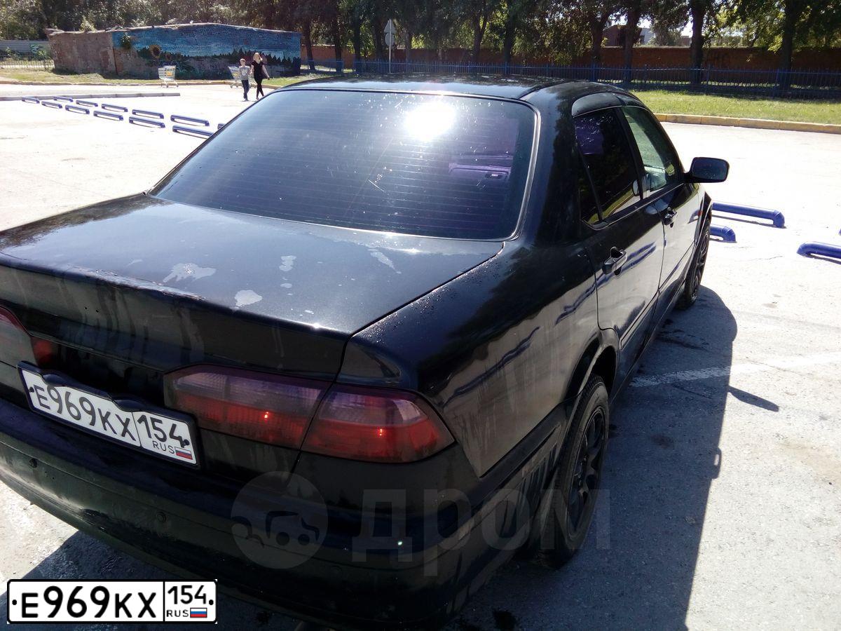 Фото автомобиля VOLKSWAGEN POLO, 2015 — госномер Е440КЕ154. Цвет: Коричневый