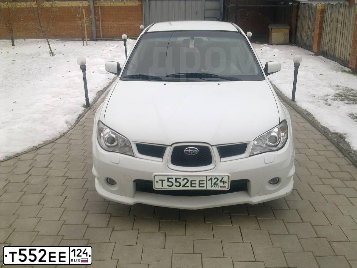 Фото автомобиля KIA CEE'D, 2010 — госномер Т522ЕЕ124. Цвет: Серый