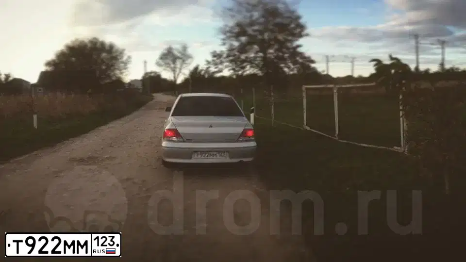 Фото автомобиля MITSUBISHI LANCER, 2001 — госномер К393НВ138