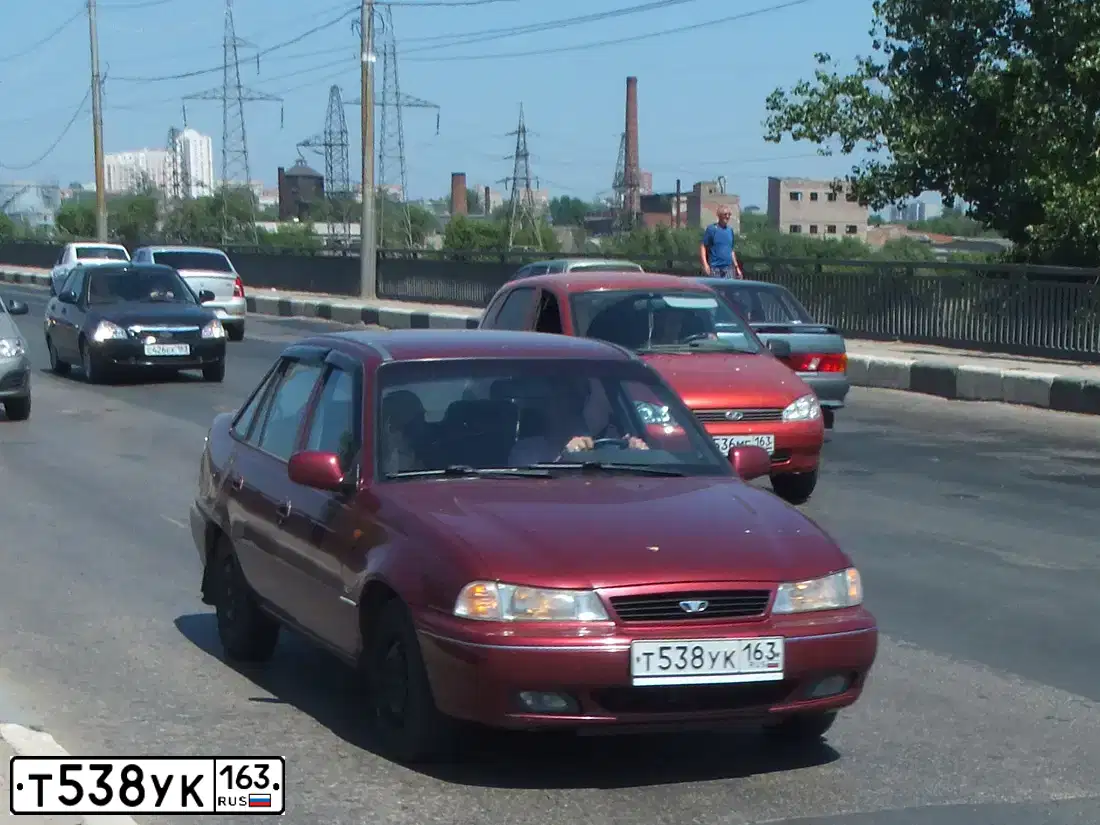 Фото автомобиля RENAULT LOGAN, 2012 — госномер Х328СС163. Цвет: ЧЕРНЫЙ