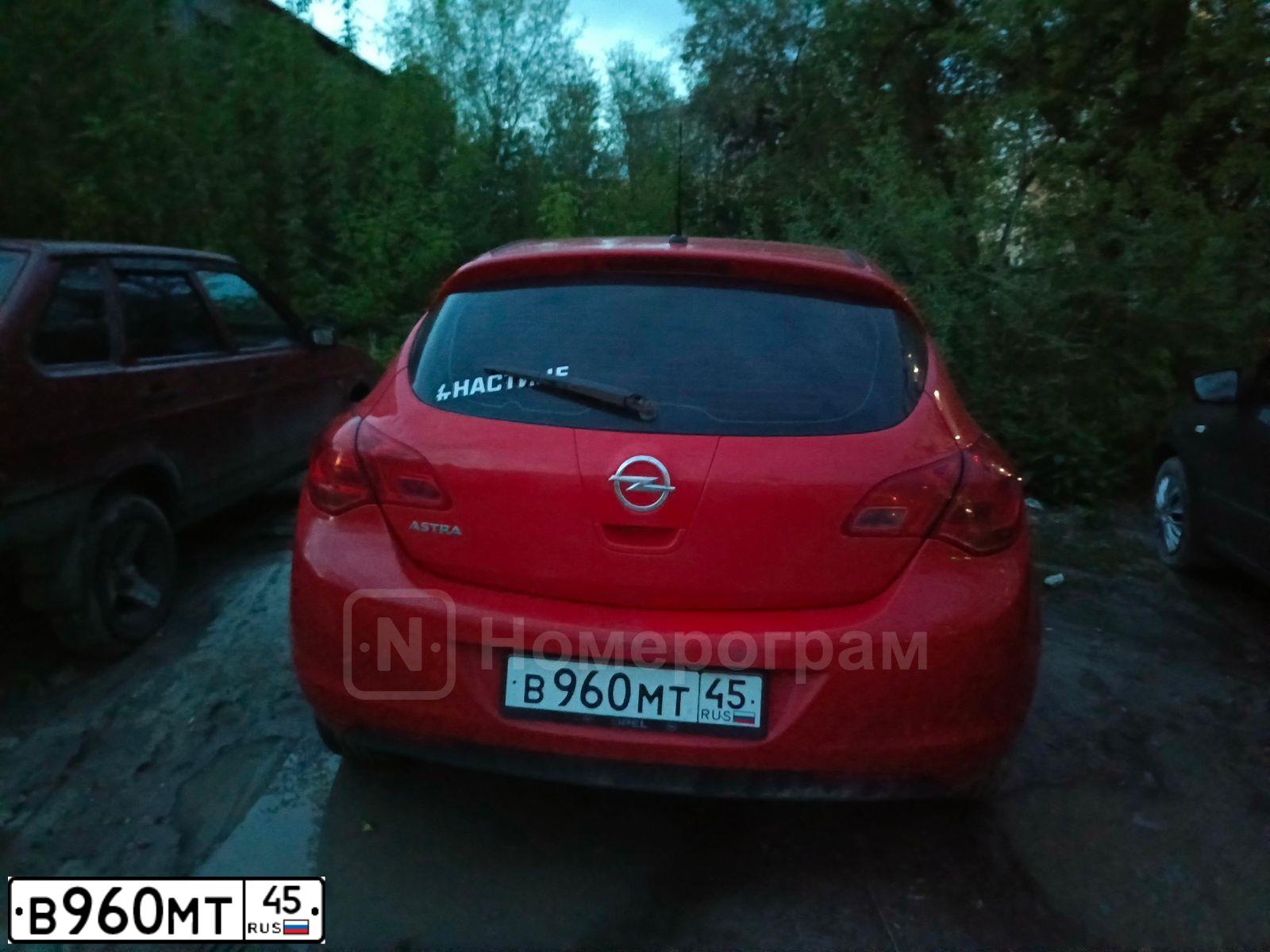 Фото автомобиля OPEL ASTRA, 2011 — госномер О188КА72. Цвет: Красный