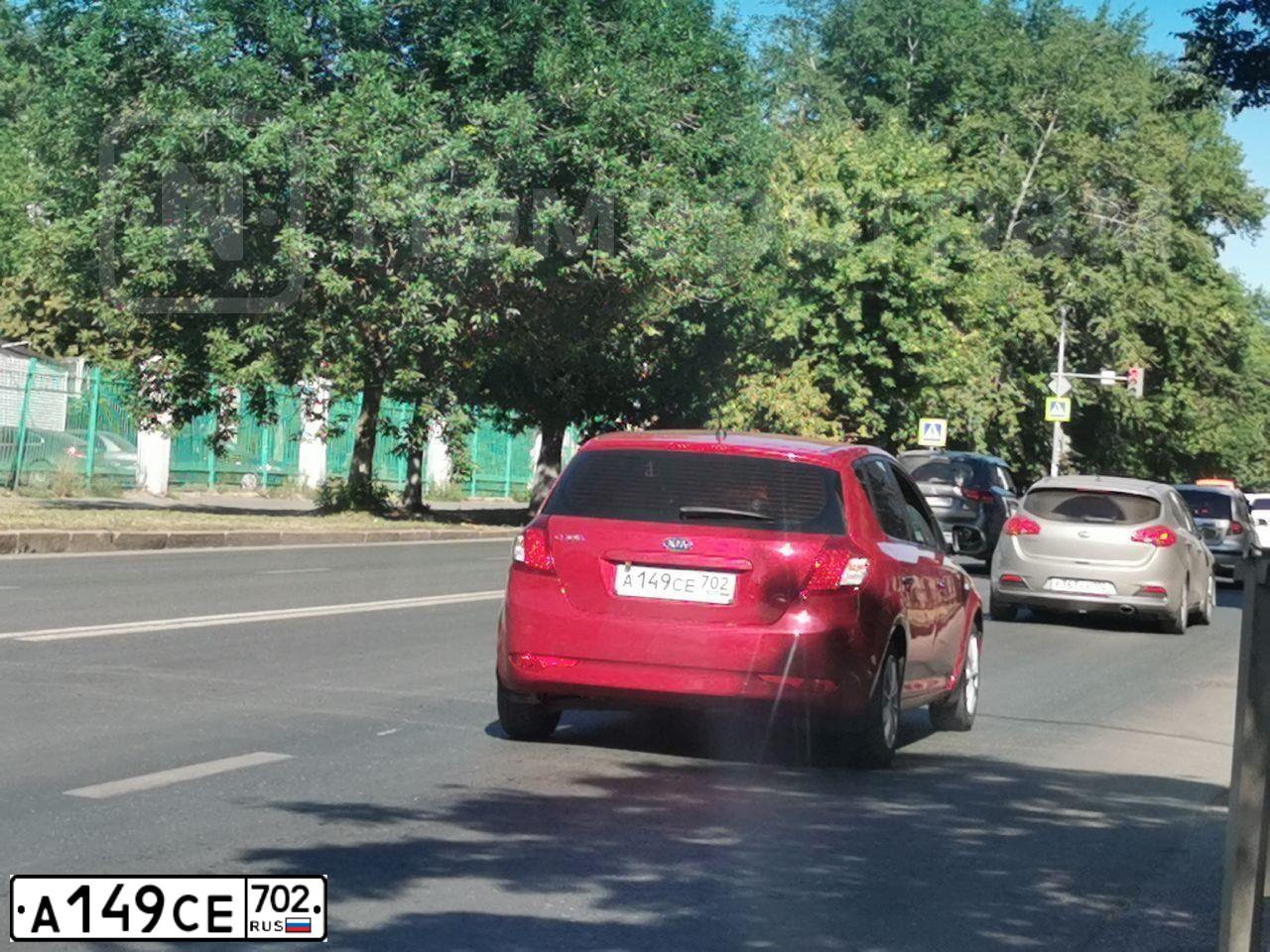 Фото автомобиля KIA CEE'D, 2012 — госномер А149СЕ702. Цвет: Красный