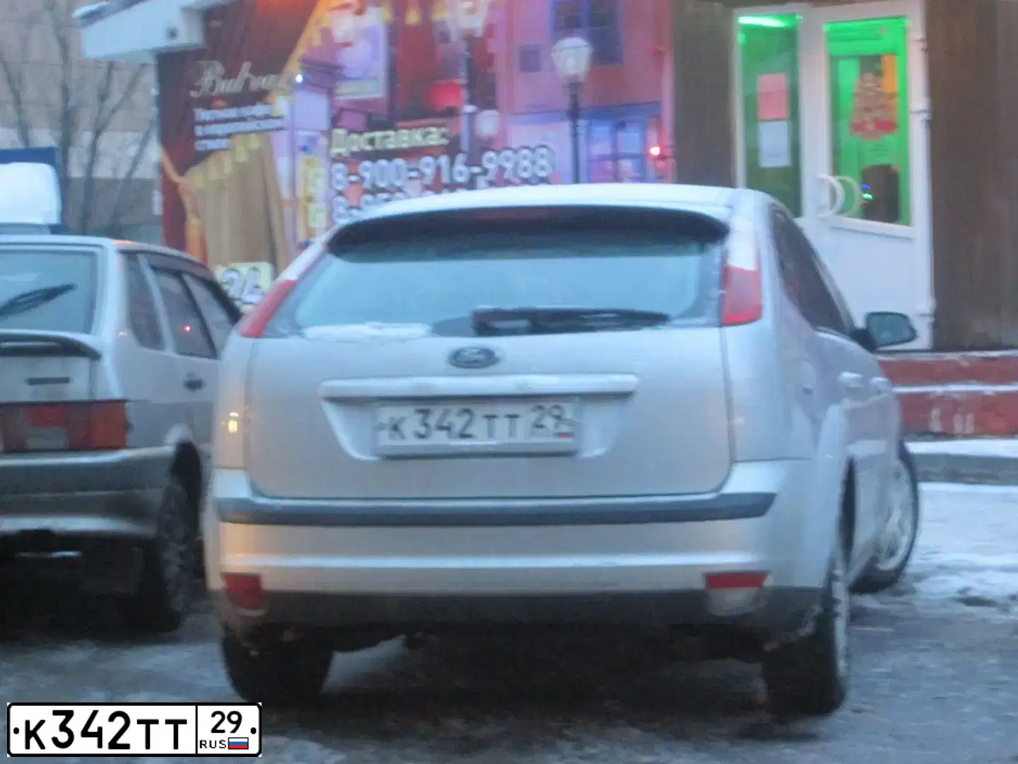 Фото автомобиля FORD D FOCUS, 2007 — госномер К342ТТ29. Цвет: СВЕТЛО-СЕРЫЙ