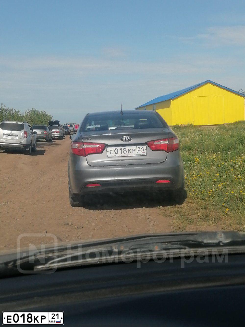 Фото автомобиля KIA RIO, 2014 — госномер Е018КР21