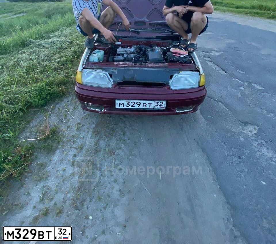 Фото автомобиля LADA 2114 SAMARA, 2004 — госномер М329ВТ32. Цвет: ТЕМНО-МАЛИНОВЫЙ