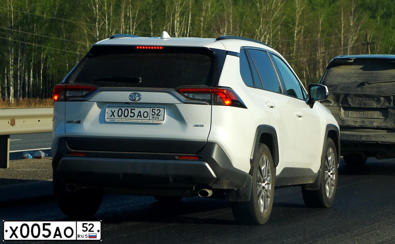 Фото автомобиля PEUGEOT 308, 2010 — госномер М215НС152. Цвет: Белый