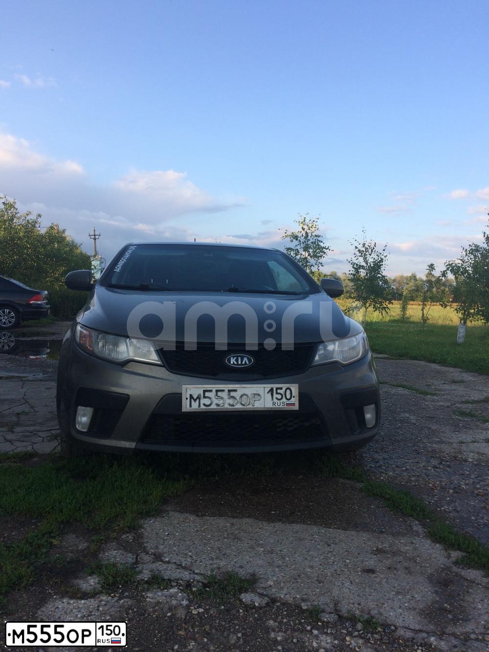 Фото автомобиля KIA CERATO, 2011 — госномер Р027ОК790. Цвет: Серый