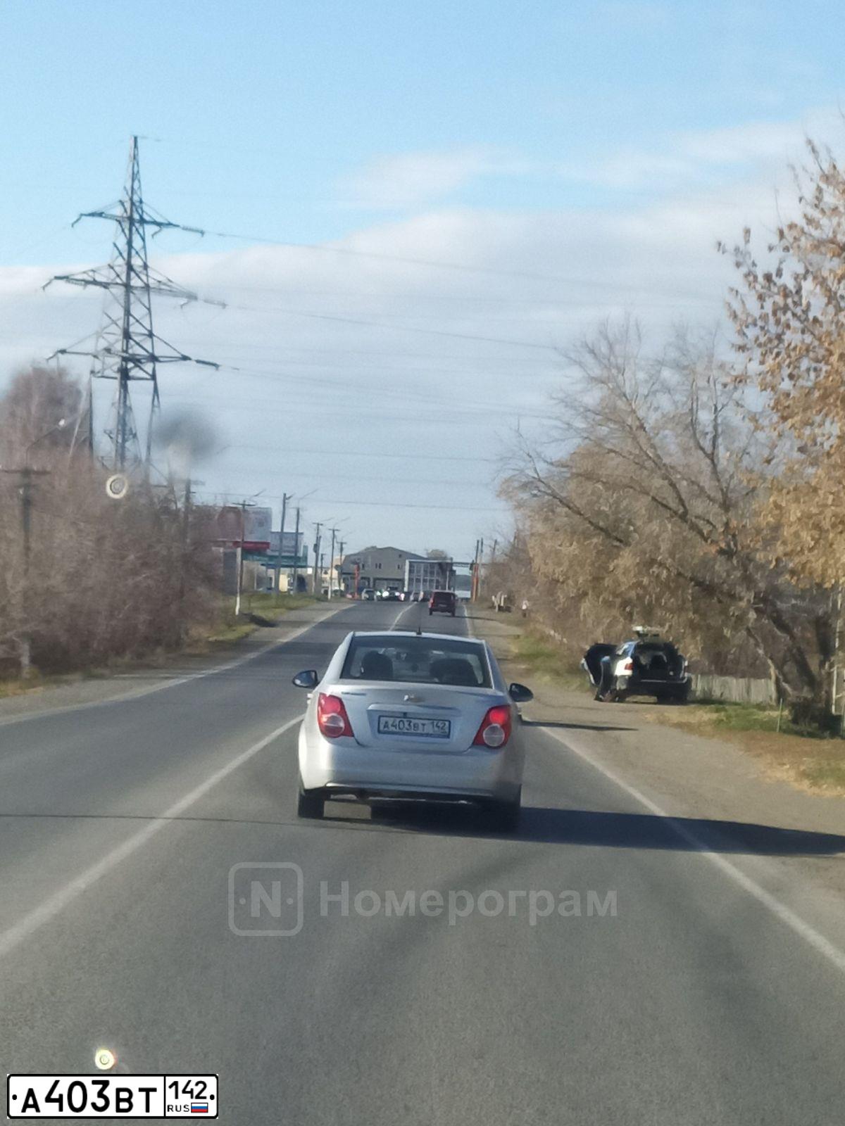 Фото автомобиля CHEVROLET AVEO, 2012 — госномер А403ВТ142. Цвет: Серебристый