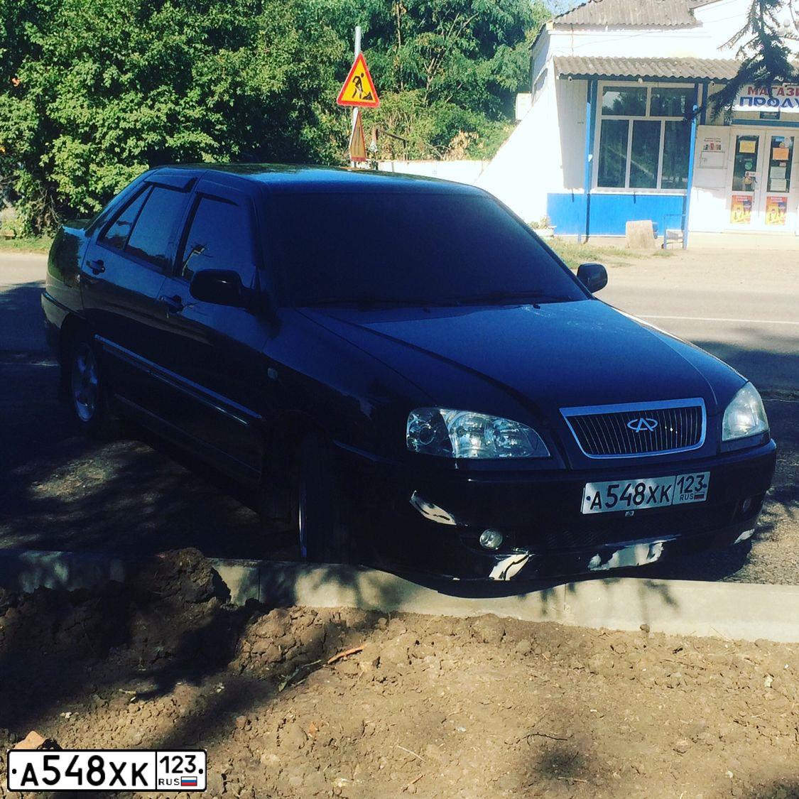 Фото автомобиля CHERY AMULET /FLAGCLOUD/, 2007 — госномер А548ХК123. Цвет: ЧЕРНЫЙ