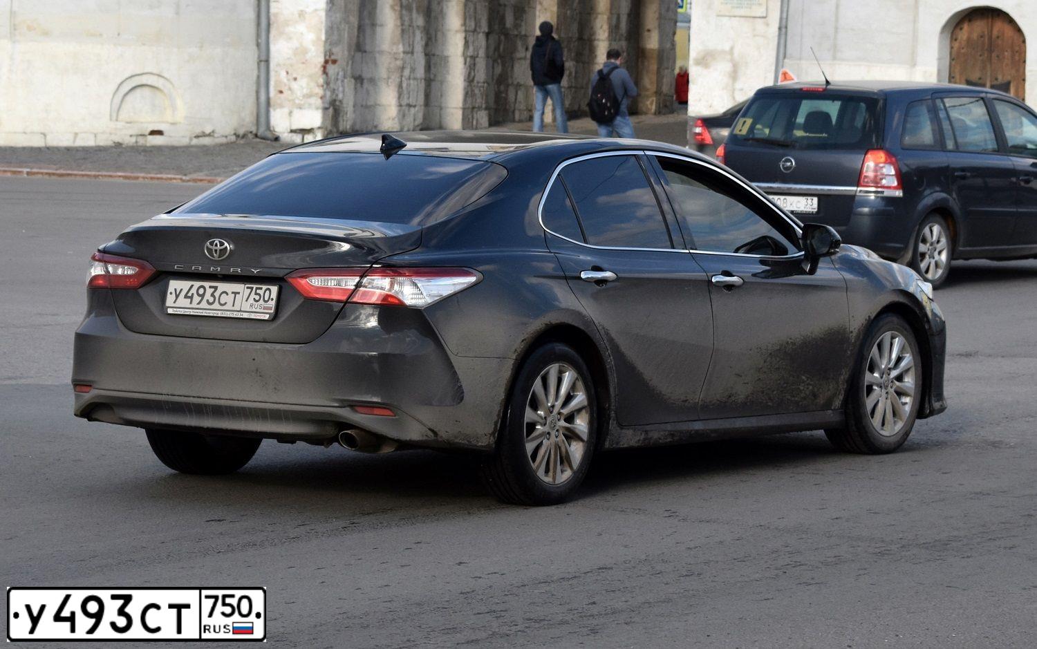 Фото автомобиля TOYOTA CAMRY, 2018 — госномер В909ОС89. Цвет: ЧЕРНЫЙ МЕТАЛЛИК