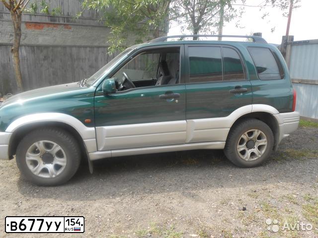 Фото автомобиля SUZUKI GRAND VITARA, 2004 — госномер В677УУ154. Цвет: ЗЕЛЁНЫЙ