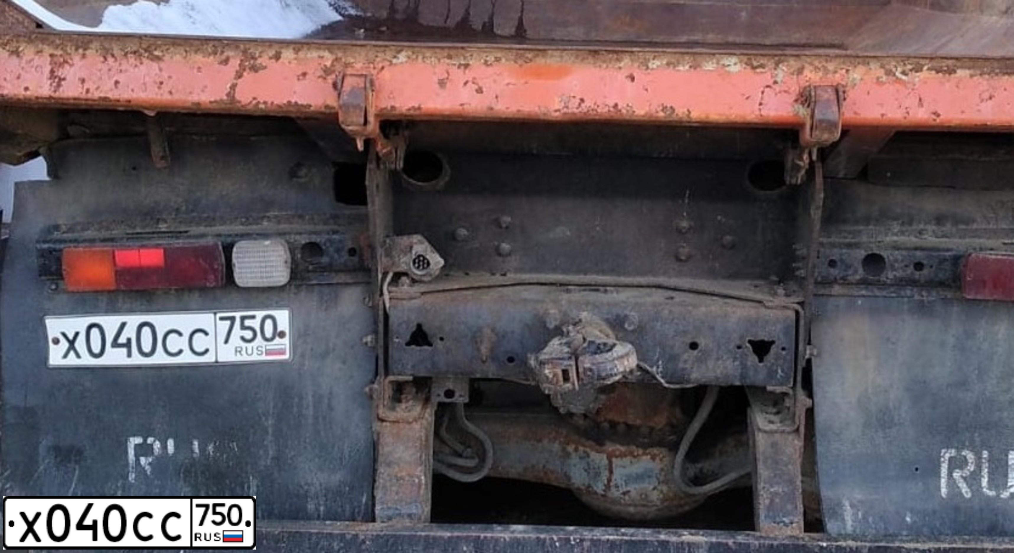 Фото автомобиля KAMAZ 65115 /6X4/, 2001 — госномер У045СК97. Цвет: Оранжевый
