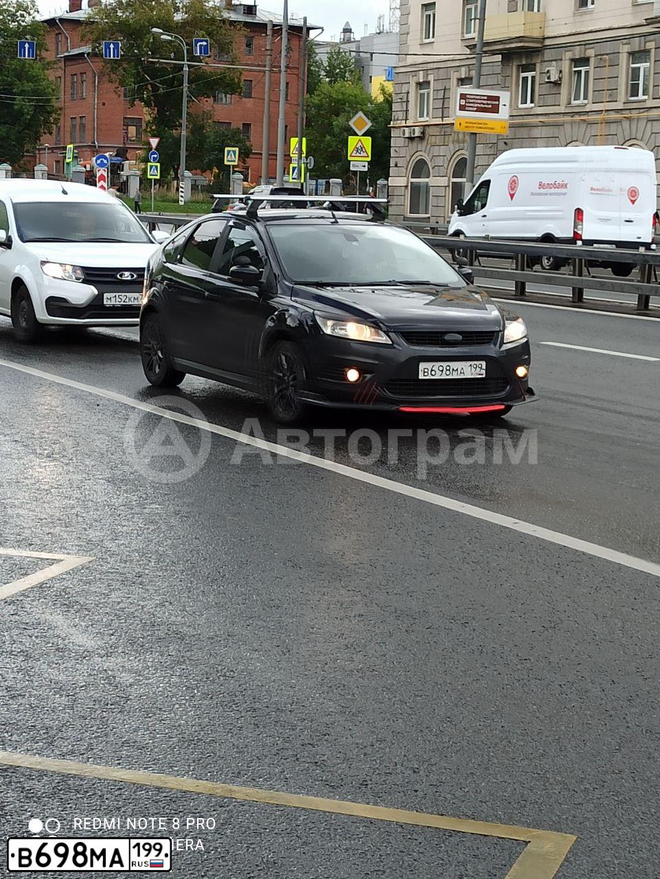 Фото автомобиля FORD FOCUS, 2008 — госномер В698МА199. Цвет: ЧЕРНЫЙ