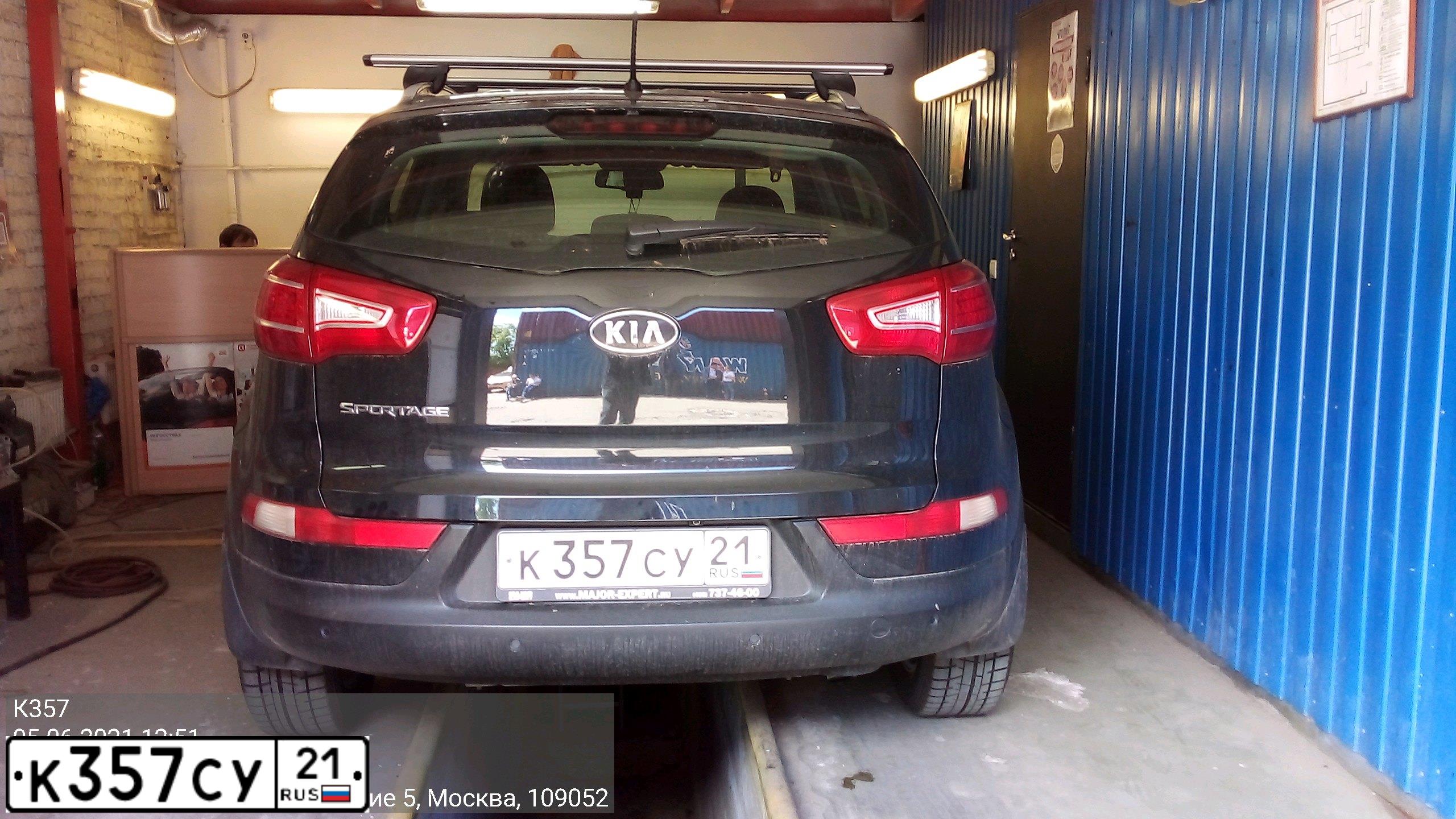 Фото автомобиля KIA SPORTAGE, 2011 — госномер К357СУ21. Цвет: ЧЕРНЫЙ