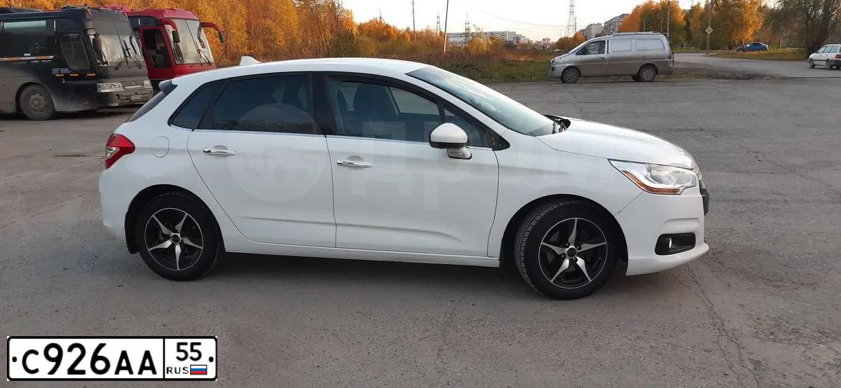 Фото автомобиля CITROEN C4, 2011 — госномер У886ЕО72. Цвет: Белый