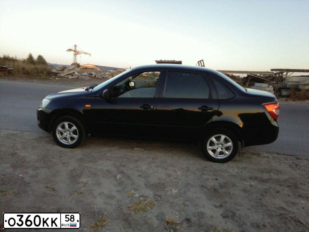 Фото автомобиля LADA GRANTA, 2012 — госномер К099ЕН181. Цвет: Сине-Черный