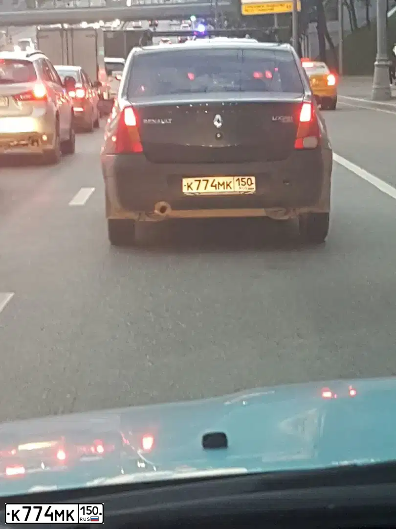 Фото автомобиля RENAULT LOGAN, 2007 — госномер К774МК150. Цвет: СЕРЫЙ ТЕМНЫЙ