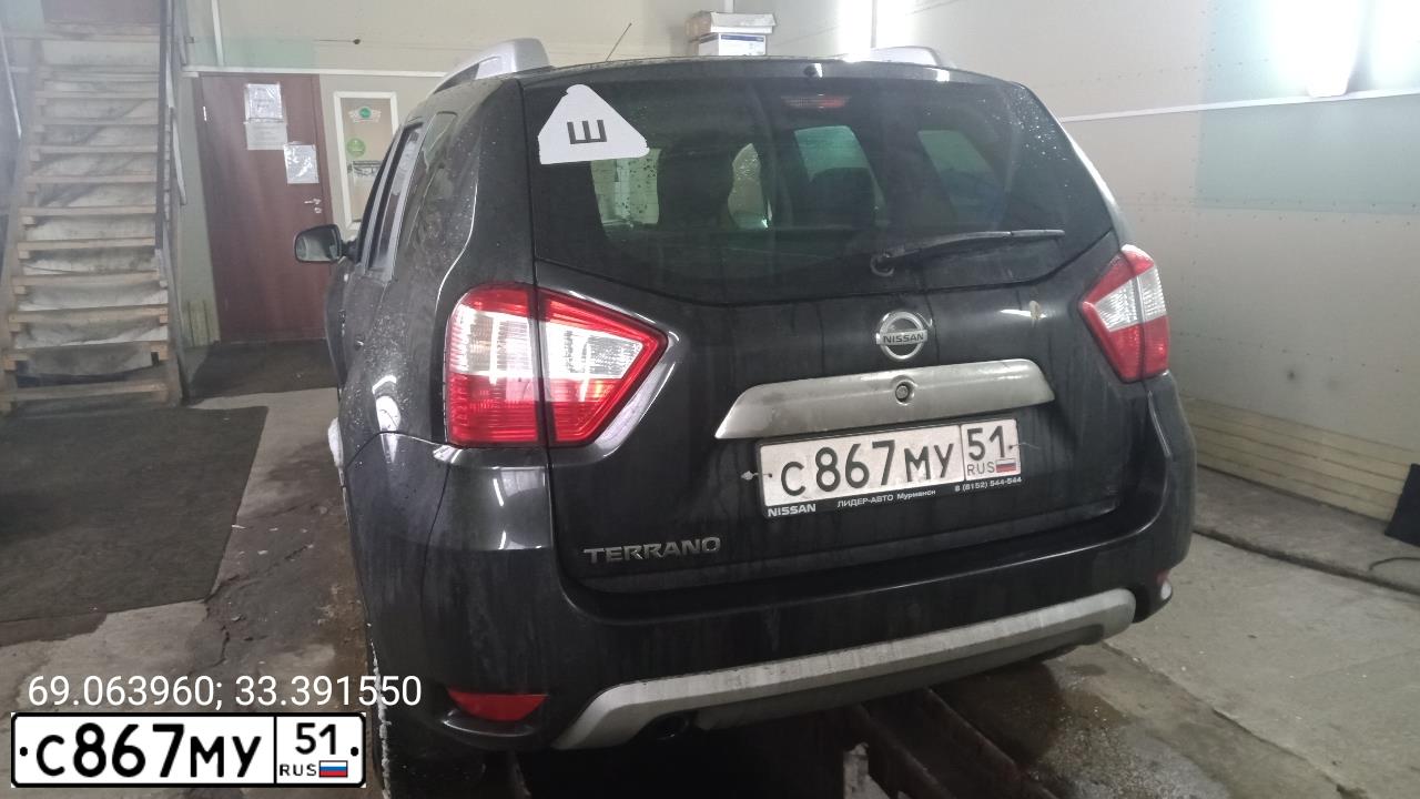 Фото автомобиля NISSAN TERRANO, 2016 — госномер О359НН29. Цвет: ЧЕРНЫЙ