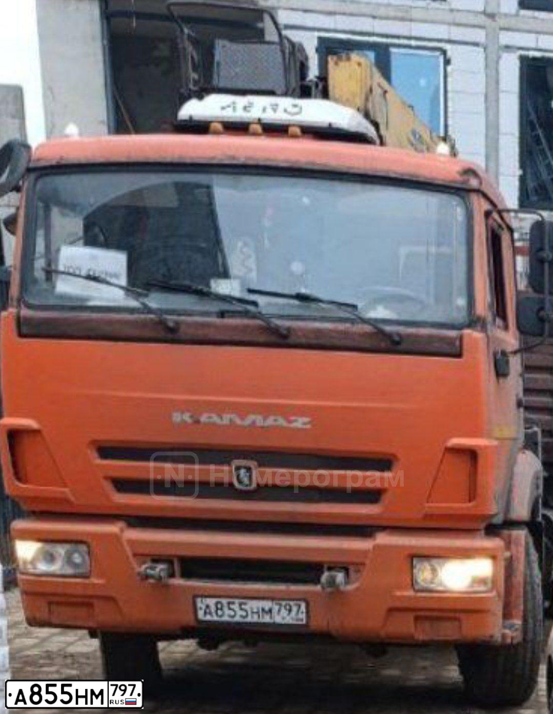 Фото автомобиля KAMAZ 65115 /6X4/, 2015 — госномер А855НМ797. Цвет: Оранжевый
