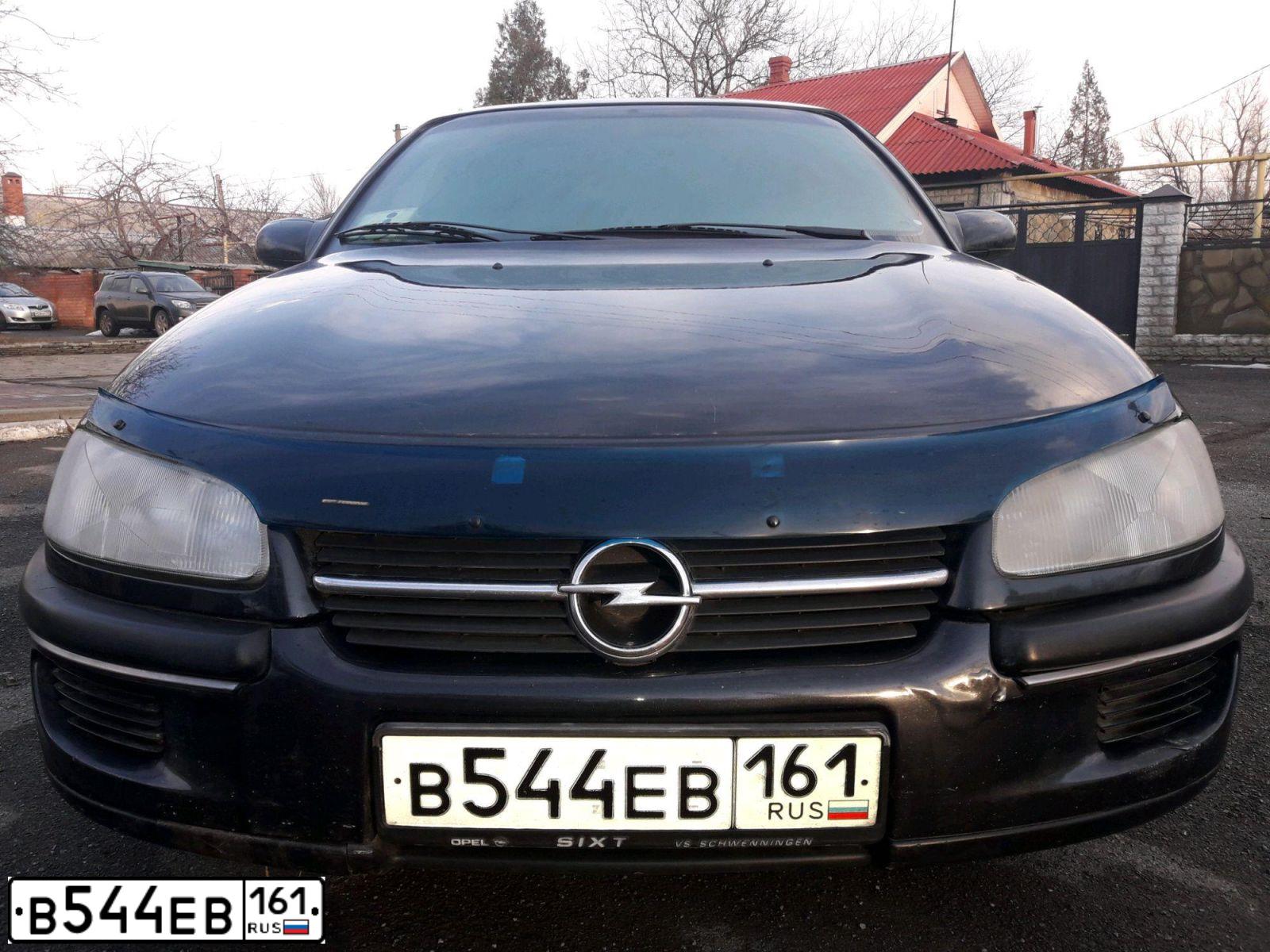 Фото автомобиля OPEL OMEGA, 1995 — госномер М259КВ761. Цвет: ЧЕРНО-СИНИЙ