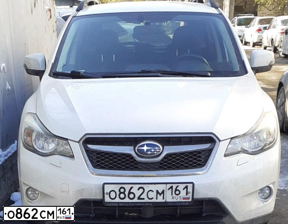 Фото автомобиля SUBARU IMPREZA, 2014 — госномер О862СМ161. Цвет: БЕЛЫЙ