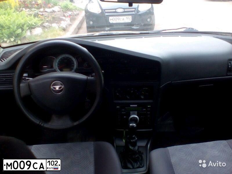 Фото автомобиля FORD FOCUS, 2013 — госномер М009СА102. Цвет: ЧЕРНЫЙ