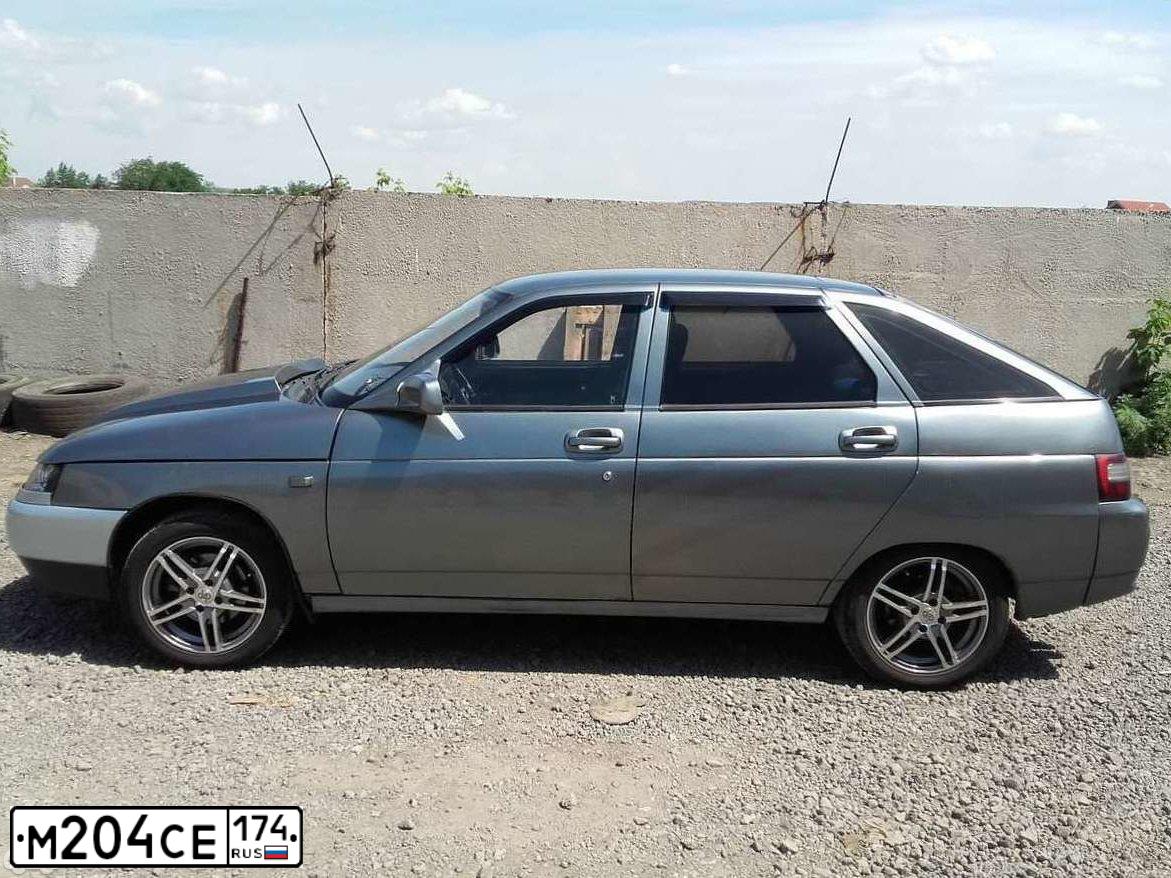 Фото автомобиля LADA 2112, 2006 — госномер М204СЕ174. Цвет: СЕРО-ЗЕЛЕНЫЙ