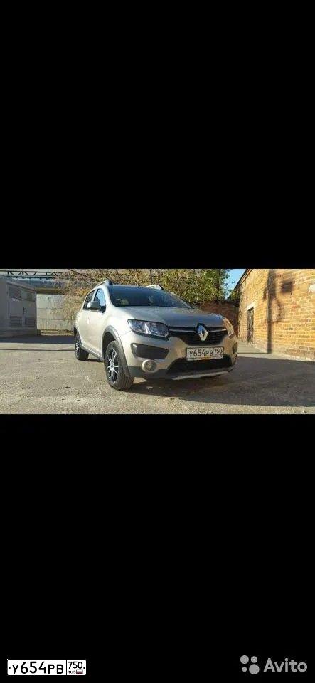 Фото автомобиля RENAULT SANDERO, 2017 — госномер У654РВ750. Цвет: БЕЖЕВЫЙ