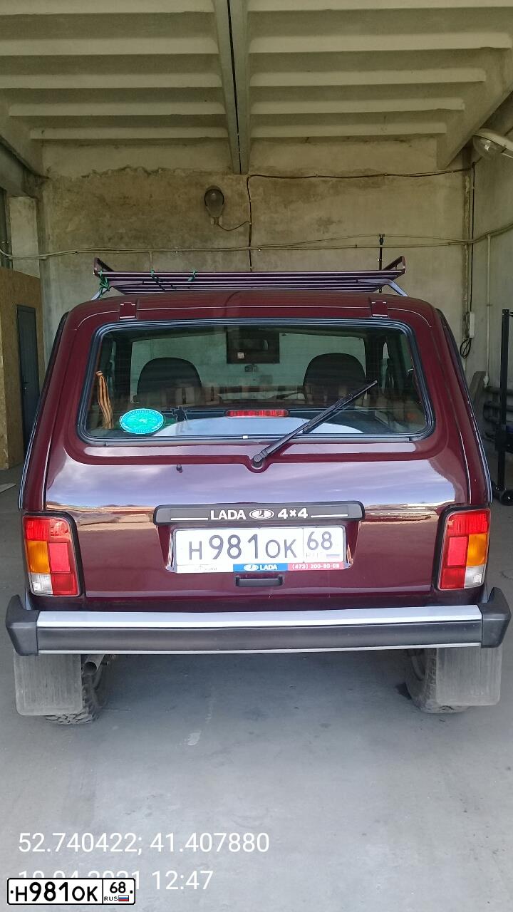 Фото автомобиля LADA 2121 NIVA, 2014 — госномер Н981ОК68. Цвет: ТЕМНО-ВИШНЕВЫЙ