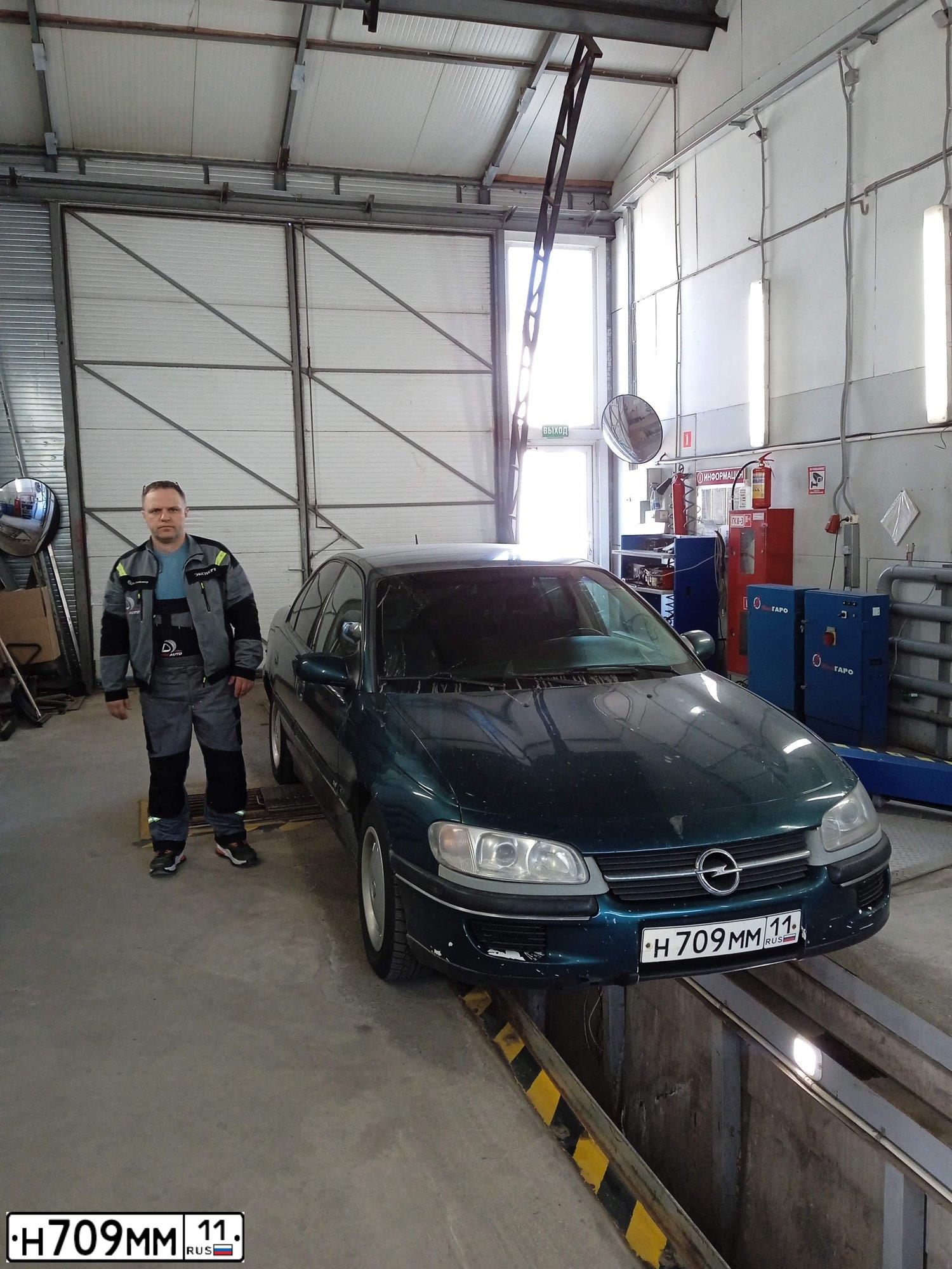 Фото автомобиля OPEL OMEGA, 1997 — госномер Н709ММ11. Цвет: ЗЕЛЕНЫЙ