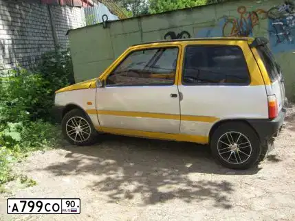 Фото автомобиля SEAZ OKA, 2003 — госномер Е087ТУ08. Цвет: ЖЕЛТО-СЕРЫЙ