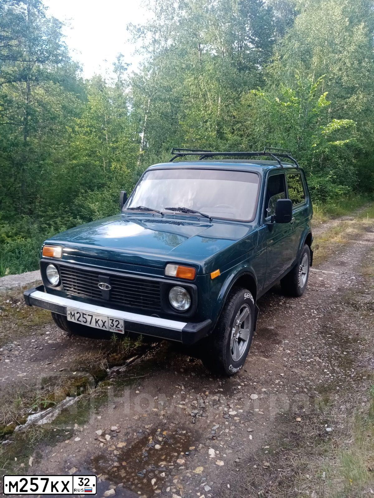 Фото автомобиля LADA 2121 NIVA, 2000 — госномер М257КХ32. Цвет: сине-зеленый